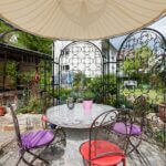Gartenpavillon Milano mit Sonnensegel und Rankgitter Rosa